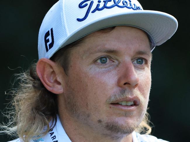 (FILES) In this file photo taken on August 26, 2022 Cameron Smith of Australia looks on during the second round of the TOUR Championship at East Lake Golf Club  in Atlanta, Georgia. - Reigning British Open champion Cameron Smith said August 31, 2022 that major tournaments could be harmed if players in the Saudi-backed LIV Golf Series do not receive world ranking points. (Photo by SAM GREENWOOD / GETTY IMAGES NORTH AMERICA / AFP)