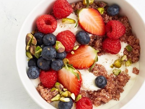 Breakfast quinoa with berries and pistachio.