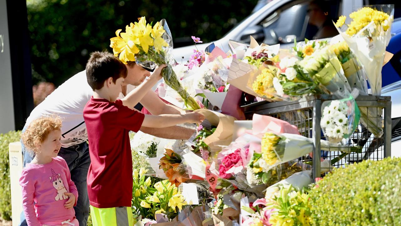 Community members stopped to pay tribute to paramedic Steven Tougher. Picture: NCA NewsWire / Jeremy Piper.