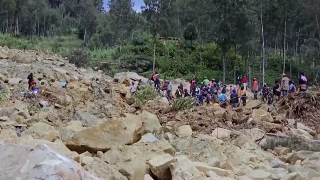 Thousands feared buried alive in Papua landslide