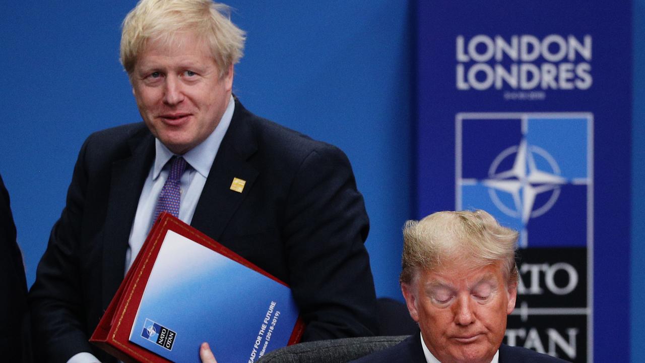 Prime Minister Boris Johnson tried to keep his distance from President Donald Trump at the NATO summit, where a Trump endorsement could backfire against him. Picture: Dan Kitwood/Getty Images