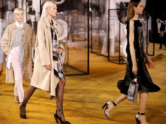 Agyness Deyn, left, is back at Burberry with Australian Catherine McNeil (centre). Picture: AFP