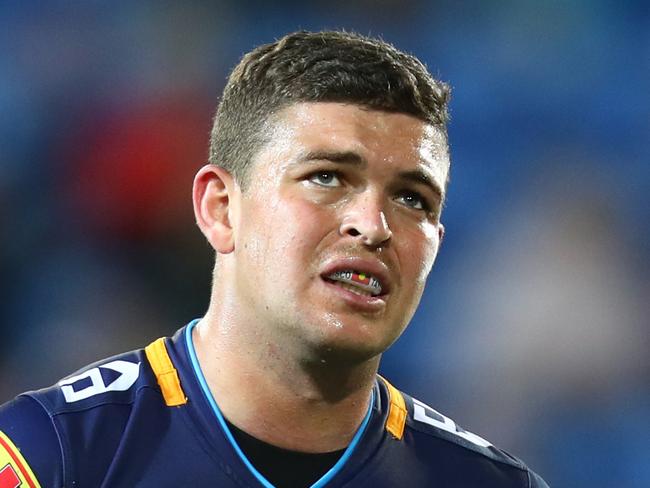 GOLD COAST, AUSTRALIA - JUNE 02: Ash Taylor and the Titans look on during the round 12 NRL match between the Gold Coast Titans and the North Queensland Cowboys at Cbus Super Stadium on June 02, 2019 in Gold Coast, Australia. (Photo by Chris Hyde/Getty Images)