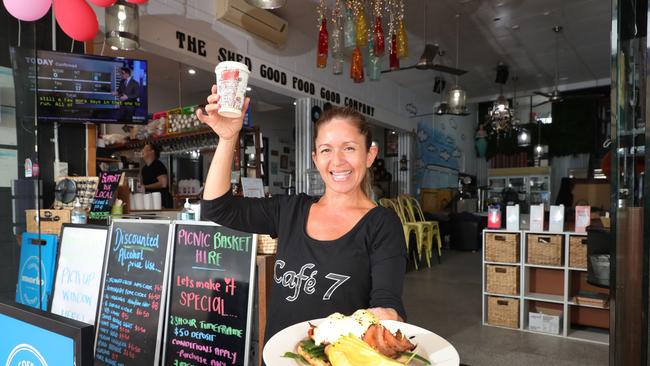 Cafes are getting ready to reopen across the Gold Coast and waitress Maria Bud can’t wait to serve food to people again at Cafe 7 at Paradise Point. Picture: Glenn Hampson.