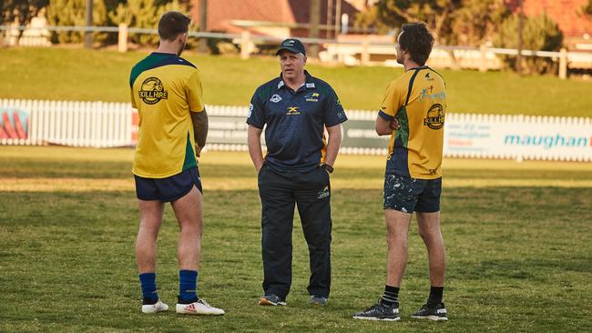 Godden speaks with his players at training on Monday night. Picture: Matt Loxton.