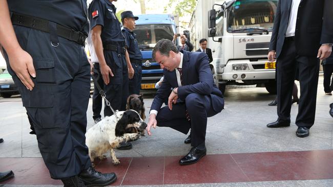 Keenan isn’t interested in playing the games of politics. Pictured here meeting with Chinese authorities and their narcotics dogs. Picture Gary Ramage