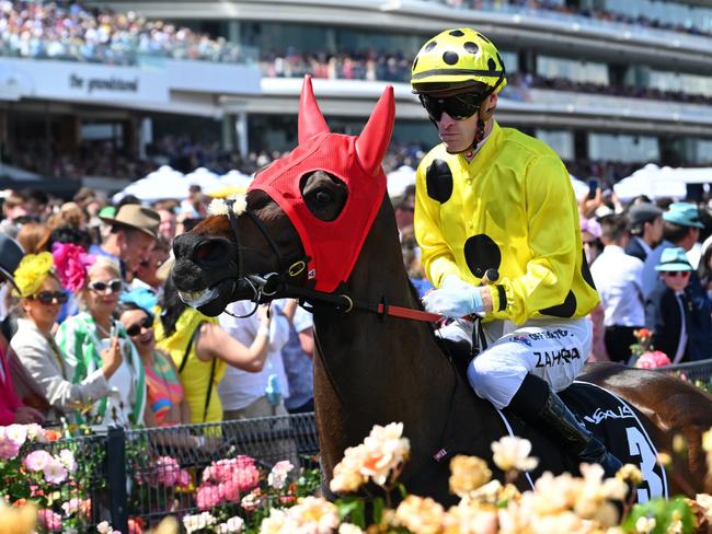 MELBOURNE, AUSTRALIA - NOVEMBER 07: Mark Zahra riding Without A Fight before winning Race 7, the Lexus Melbourne Cup,  during Melbourne Cup Day at Flemington Racecourse on November 07, 2023 in Melbourne, Australia. (Photo by Vince Caligiuri/Getty Images)