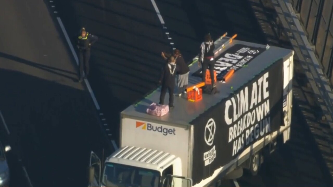 Climate activists blocking traffic on Melbourne bridge