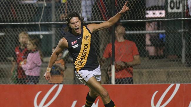 Glenelg’s Max Proud celebrates after he kicked a goal.