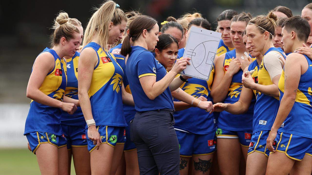 PERTH, AUSTRALIA - AUG 16: Daisy Pearce, Senior Coach of the Eagles addresses the players at the quarter time break during the 2024 AFLW Practice Match between the West Coast Eagles and the St Kilda Saints at Mineral Resources Park on August 16, 2024 in Perth, Australia. (Photo by Will Russell/AFL Photos via Getty Images)