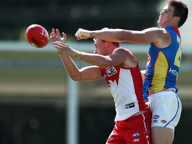 Will Hayward of the Swans is challenged by Sam Collins of the Suns during the 2019 JLT Community Series AFL match between the Sydney Swans and the Gold Coast Suns at Oakes Oval on March 10, 2019 in Lismore, Australia. Picture: Matt King/Getty Images.