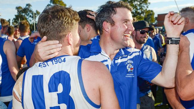 Athelstone coach Jade Sheedy celebrates with player James Davies. Picture: AAP/Brenton Edwards