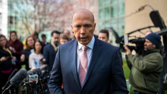 Former home affairs minister Peter Dutton faces the media yesterday. Picture: AFP