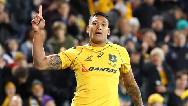 Israel Folau celebrates after scoring a try during The Rugby Championship match between the Wallabies and the Pumas at Canberra Stadium last September.