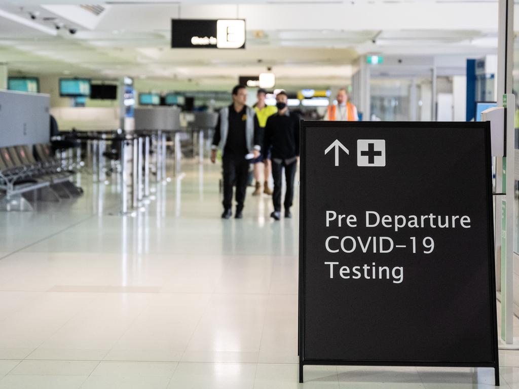 A sign for pre-departure Covid-19 testing at Sydney Airport.