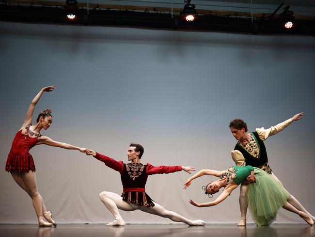 Dancers of The Australian Ballet, Ako Kondo (L) and Brett Chynoweth (2L), and Sharni Spencer (2R) and Callum Linnane, perform during a media showcase at the Royal Opera House in London on July 31, 2023, ahead of the performance 'Jewels'. The Australian Ballet's 'Jewels', led by artistic director David Hallberg, is set to run from August 2 to 5. (Photo by HENRY NICHOLLS / AFP)