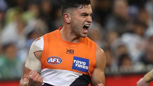 Giants Tim Taranto celebrates goal during the AFL Preliminary Final match between the GWS Giants and the Collingwood Magpies at the MCG. Picture. Phil Hillyard