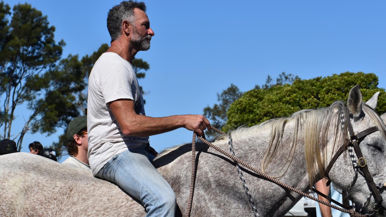 A protester rides a horse. Photo: Liana Walker