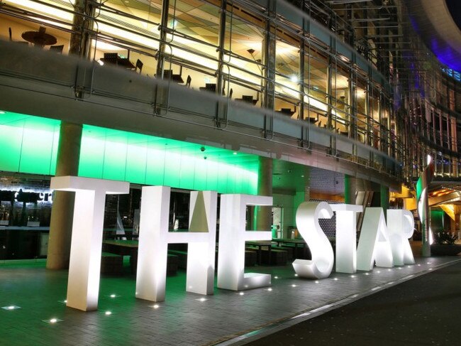 The Star casino, operated by Echo Entertainment Group Ltd., stands illuminated at night in Sydney, Australia, on Monday, Aug. 10, 2015. Echo Entertainment is scheduled to report full-year results on Aug. 12. Photographer: Brendon Thorne/Bloomberg