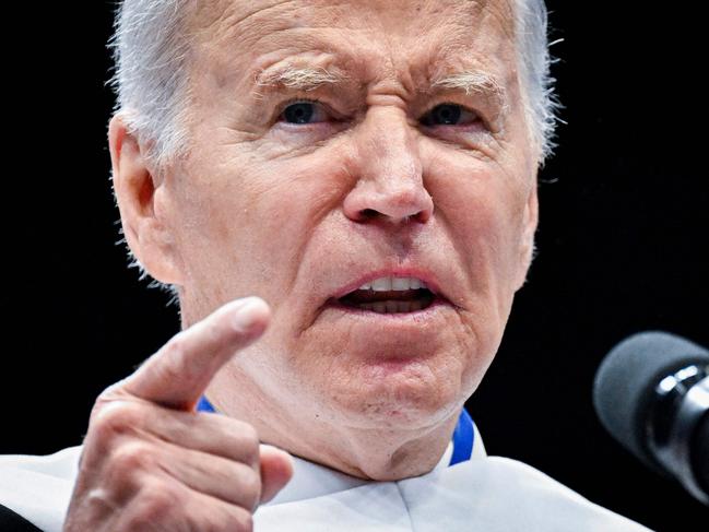 US President Joe Biden delivers the commencement address during the 2023 Howard University Spring graduation ceremony at Capitol One Arena in Washington, DC, on May 13, 2023. (Photo by Mandel NGAN / AFP)