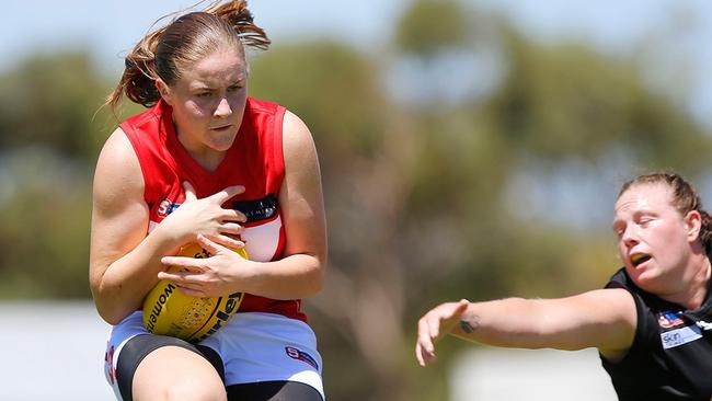 Katelyn Rosenzweig takes a strong mark for North Adelaide in the SANFLW this season. Picture: Deb Curtis