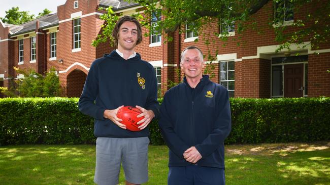 Ballarat Grammar director of sport Dean Rossato with Year 12 student boarder Floyd Burmeister.