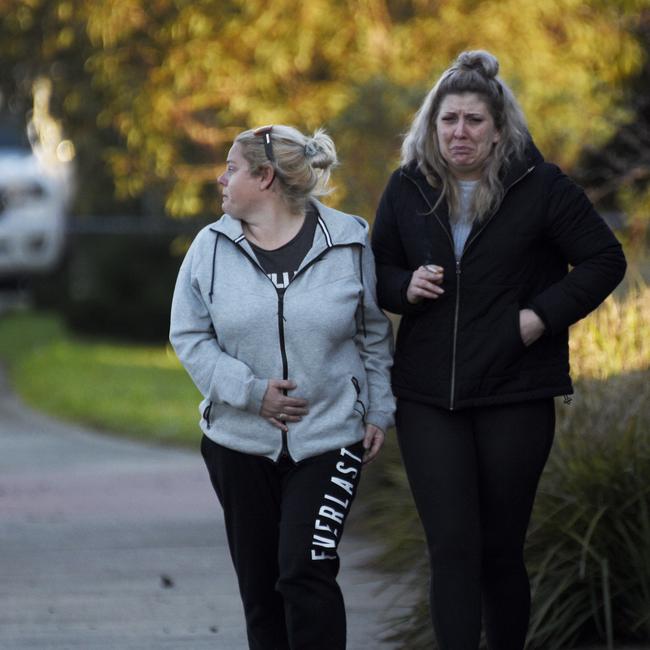 People have brought flowers to the scene of crash to pay tribute. Picture: Andrew Henshaw.