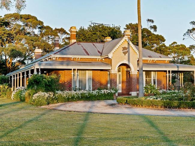 The iconic home features five, bedrooms and three bathrooms.