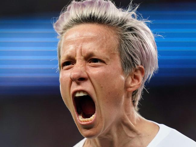 (FILES) United States' forward Megan Rapinoe celebrates after scoring a goal during the France 2019 Women's World Cup quarter-final football match between France and USA, on June 28, 2019, at the Parc des Princes stadium in Paris. US womens' team star Rapinoe announced on social media on July 8, 2023, that she would be retiring from football at the end of this season. "It is with a deep sense of peace & gratitude that I have decided this will be my final season playing this beautiful game," the 38-year-old posted. (Photo by Lionel BONAVENTURE / AFP)