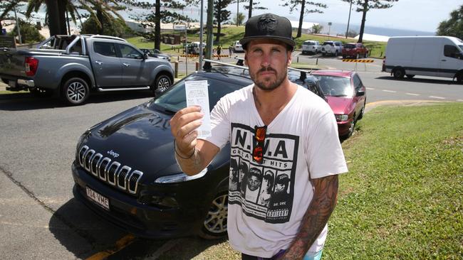 Surf Photographer Nick Maier at the corner of Petrie Street and Marine Parade, where he received a parking ticket for parking along yellow lines in Snapper Rock, venue of the Quicksilver Pro World Surf League, Coolangatta, Gold Coast. Picture: Regi Varghese