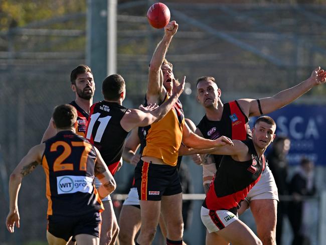 EDFL: Pascoe Vale and East Keilor players battle for the ball. Picture: Andy Brownbill