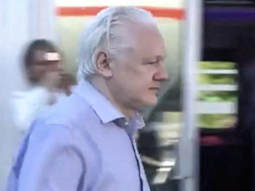 TOPSHOT - This screen shot courtesy of WikiLeaks X page shows Wikileaks founder Julian Assange walking to board a plane from London Stansted Airport on June 24, 2024. Julian Assange "is free" and has been released from a high-security London prison where he was held for five years, his Wikileaks organisation said June 24, after reaching a US plea deal. The 52-year-old Australian was taken Monday, June 24, from Belmarsh prison to London's Stansted airport, a Wikileaks statement said, from where he boarded a flight to an unnamed destination. (Photo by WikiLeaks / AFP) / RESTRICTED TO EDITORIAL USE - MANDATORY CREDIT "AFP PHOTO / HANDOUT / WikiLeaks " - NO MARKETING - NO ADVERTISING CAMPAIGNS - DISTRIBUTED AS A SERVICE TO CLIENTS