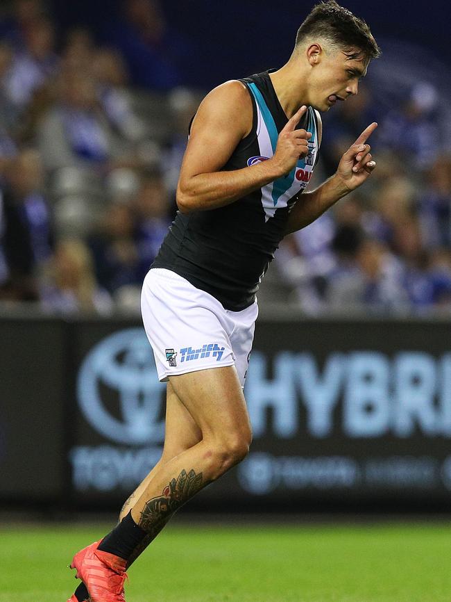 Aidyn Johnson celebrates kicking a goal against North Melbourne at Etihad Stadium last week. Picture: Graham Denholm/AFL Media/Getty Images