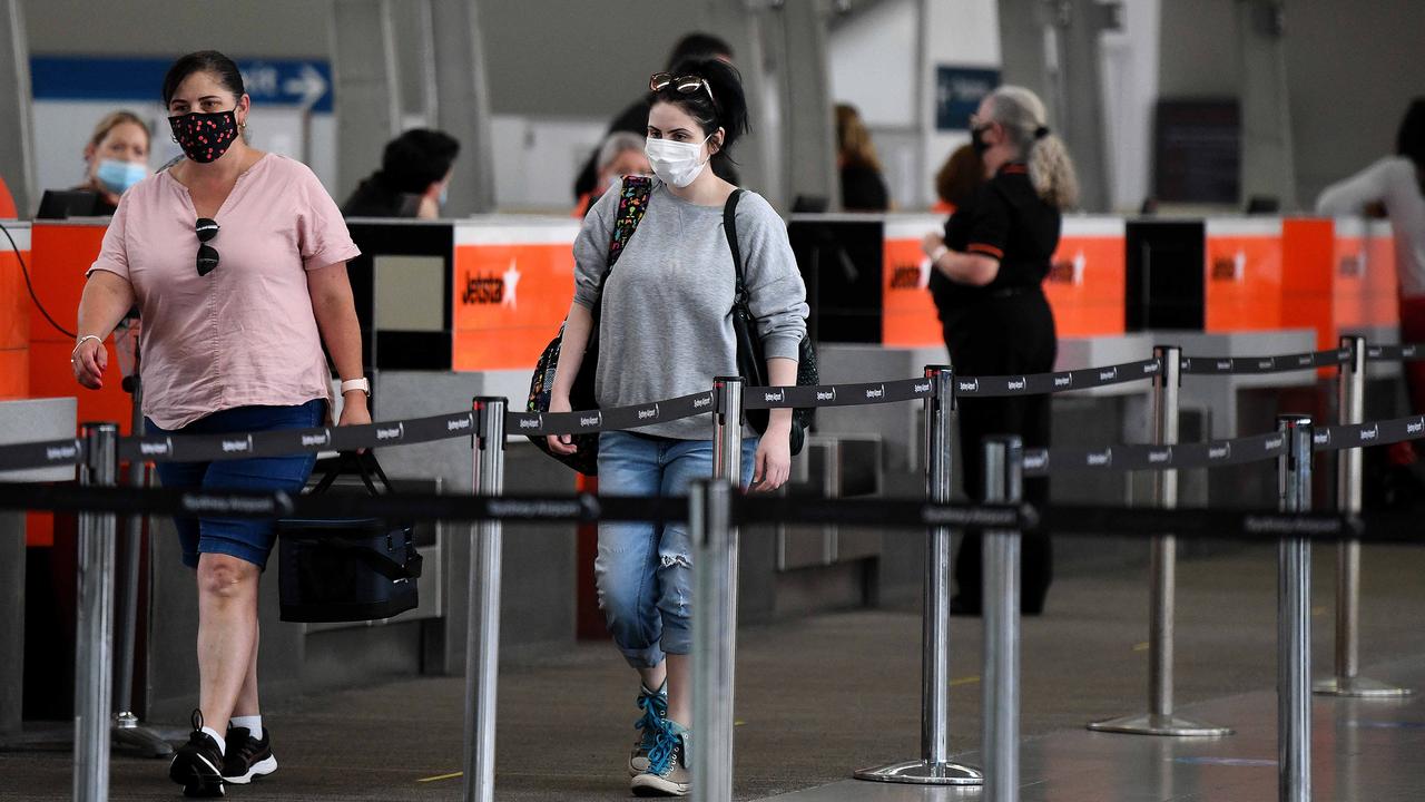 Face masks on planes Qantas and Jetstar cabin crew complain Herald Sun