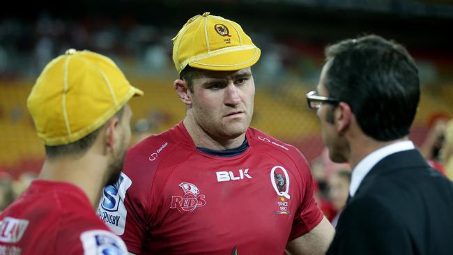 Reds v Crusaders. Quade Cooper and James Horwill chat with coach Richard Graham. Pic Mark Calleja