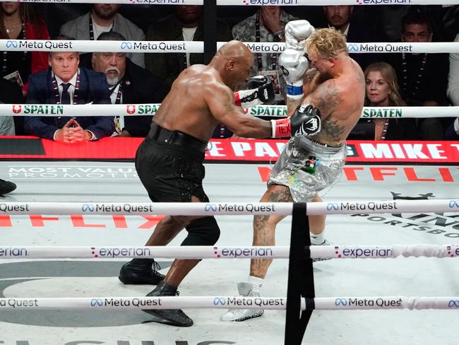 Retired heavyweight champion Mike Tyson and US YouTuber turned boxer Jake Paul. Picture: AFP