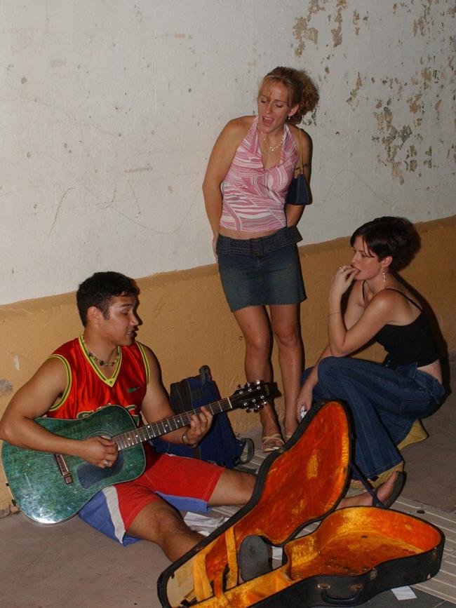 Nightclub strip. Flinders street East Picture: Bryan Lynch bl395516 Nightclub strip. Flinders street East:- busker, Matty with Lisa Turner and Melissa Collinson Picture: Bryan Lynch bl395516