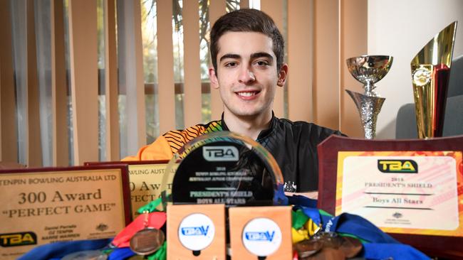 Daniel Perrella with his huge haul of awards. Picture: Penny Stephens