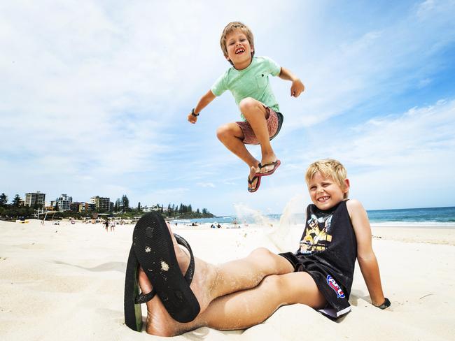 Siblings Cruz, 7, and Koda Trewin, 5, from Palmerston, have happily and comfortably worn thongs all summer. Picture: Lachie Millard