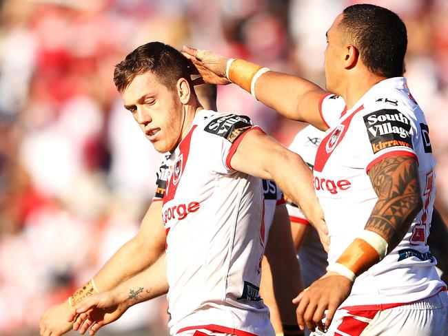 Cameron McInnes gets a pat on the head after scoring a try. Picture: Getty Images