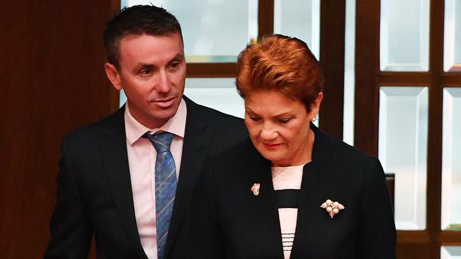 Hanson’s chief of staff, James Ashby (left) has been caught on film talking with the NRA. Picture: AAP/Mick Tsikas