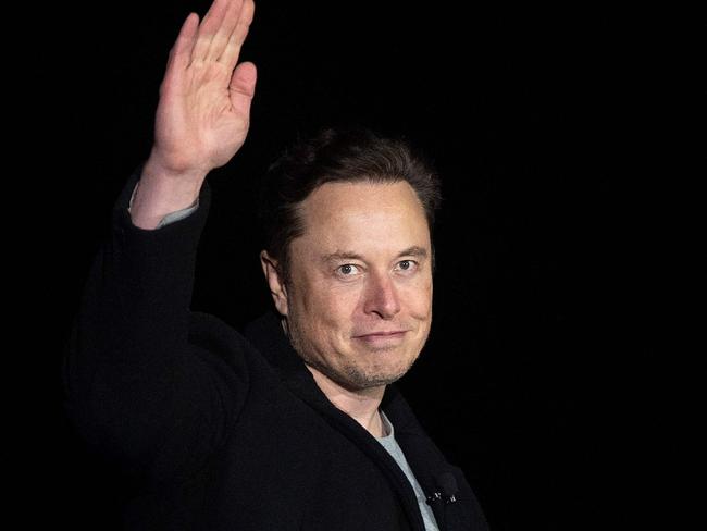 (FILES) In this file photo taken on February 10, 2022 Elon Musk gestures as he speaks during a press conference at SpaceX's Starbase facility near Boca Chica Village in South Texas. - Elon Musk late Tuesday said he will resign as chief executive of Twitter once he finds a replacement, in apparent respect of a poll he himself launched that revealed users wanted him to step down. 
