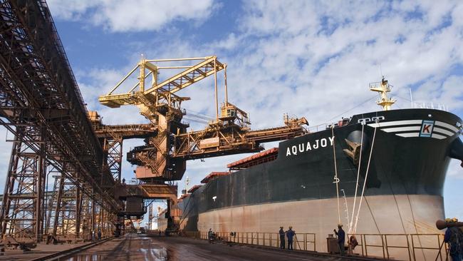 Iron ore is loaded onto a freighter at the Ponta da Madeira Maritime Terminal in Brazil. Picture: Marcos Issa/Bloomberg News.