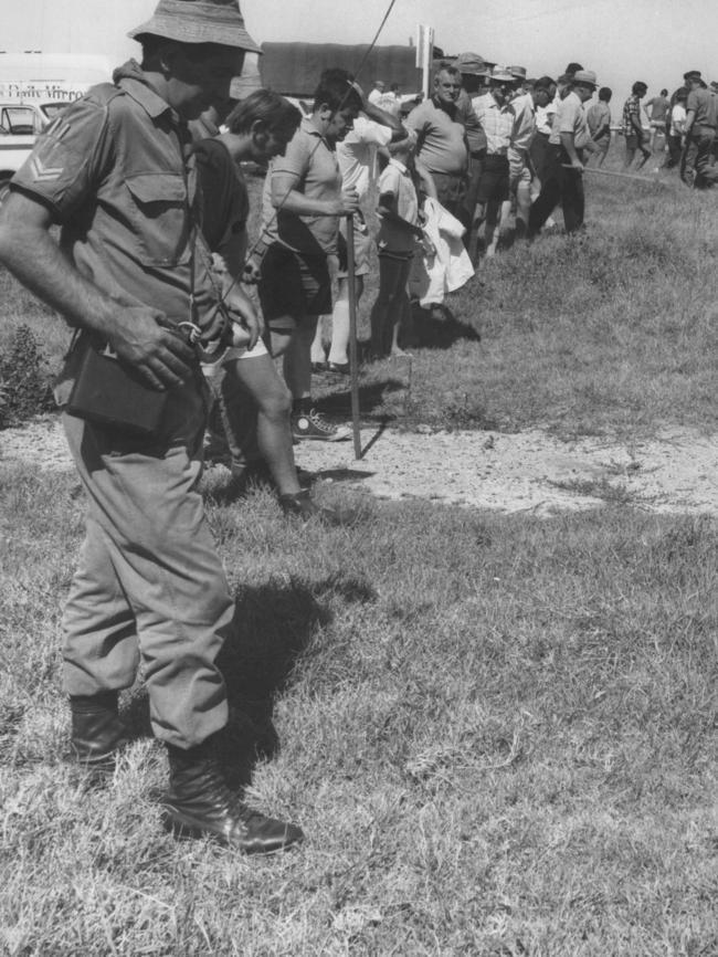 Police and volunteers combing the area for the young girl.