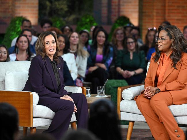 US Vice President and Democratic presidential candidate Kamala Harris (L) joins US television producer Oprah Winfrey at a 'Unite for America' live streaming rally in Farmington Hills, Michigan, on September 19, 2024. (Photo by SAUL LOEB / AFP)