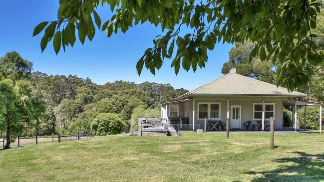 The three-bedroom cottage is on the main Falls property.