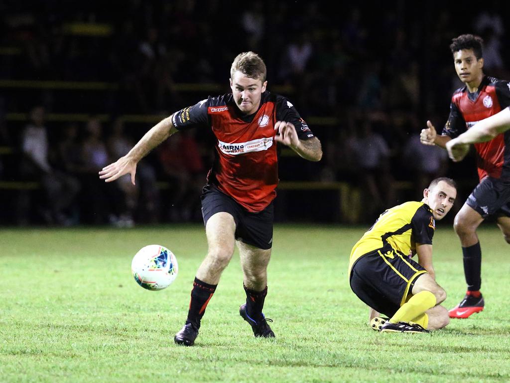 Lions' Nathan Harris charges down the loose ball in the FNQ Premier League men's match between the Edge Hill Tigers and the Leichhardt Lions, held at Tiger Park, Maunda. Picture: Brendan Radke