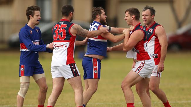 Gepps Cross and Eastern Park players clash during a division four match last season. Picture: AAP/James Elsby.