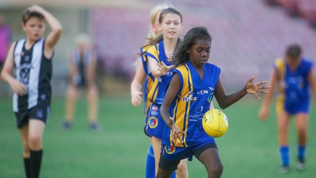 Tonisha Kenyon on the ball for the Wanderers Football Club all-girl U12s team that plays in the mixed Division 3 competition. Picture: Glenn Campbell