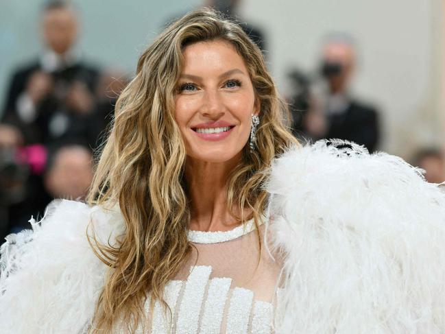 Brazilian model Gisele Bundchen arrives for the 2023 Met Gala at the Metropolitan Museum of Art on May 1, 2023, in New York. - The Gala raises money for the Metropolitan Museum of Art's Costume Institute. The Gala's 2023 theme is âKarl Lagerfeld: A Line of Beauty.â (Photo by Angela WEISS / AFP)